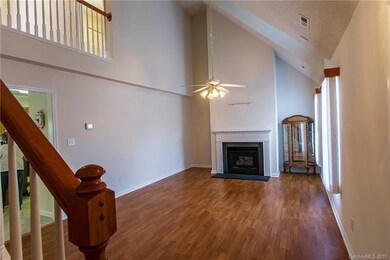 Great Room with vaulted ceiling and gas fireplace.