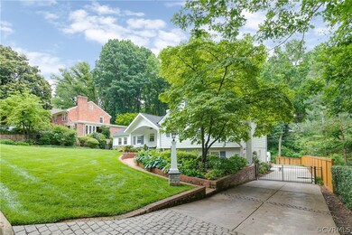 Automatic gate with stamped concrete driveway