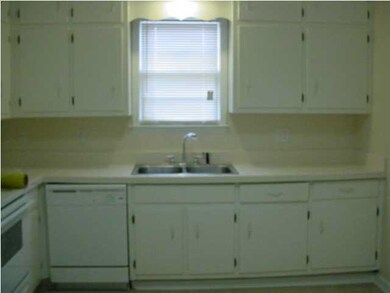 Kitchen with new tile countertops and backsplash