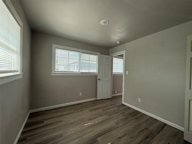 Another view of primary bedroom