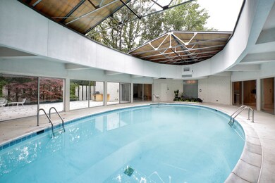 The pool has a fully retractable roof and heated f
