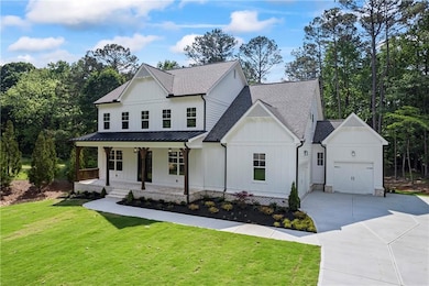 Modern inspired farmhouse with board and batten si