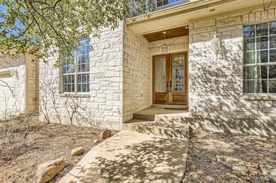 Entrance to property featuring french doors