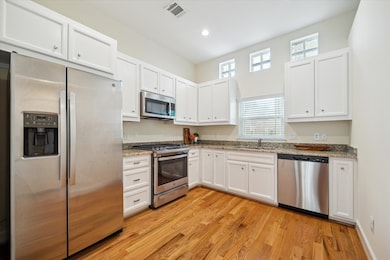 Kitchen showcasing stainless appliances