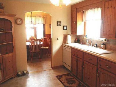 Kitchen Hand made cabinets and smooth surface coun