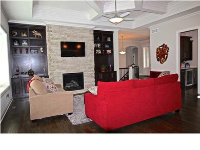 Stunning living room with impressive wood trim acc