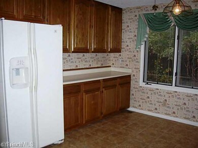 Kitchen. View 1 -- eat in with lots of cabinet space!