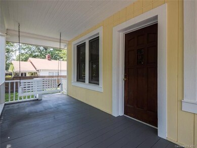Relax in the front porch swing!