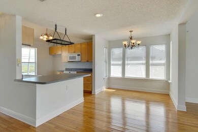 open floor plan with dinning nook, bar, kitchen an