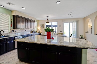 Kitchen with tasteful backsplash, visible vents, a