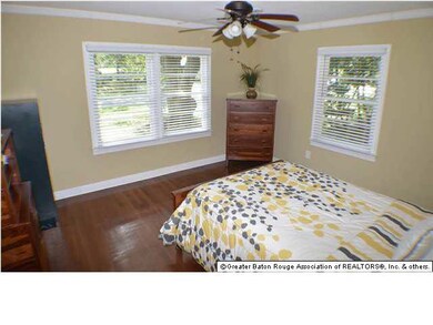Bedroom 2 with original hardwood floors