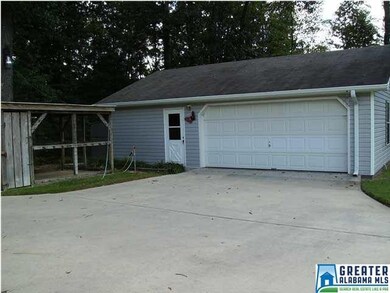 Detached garage. With a dog attached to the rear o