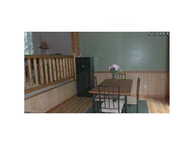 Dining room with sliders to private rear deck over