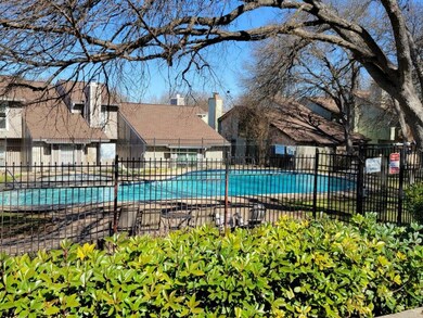 Pool featuring fence