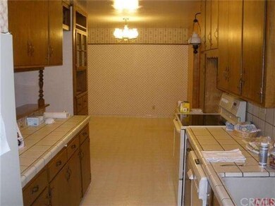 Kitchen looking into breakfast nook.