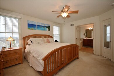 Master bedroom with Master bathroom and walk-in cl