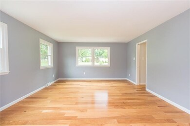 Spacious Formal Living room with neutral tones and