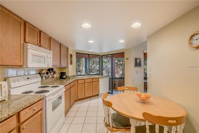 Kitchen with Wood Cabinets and Granite Counters