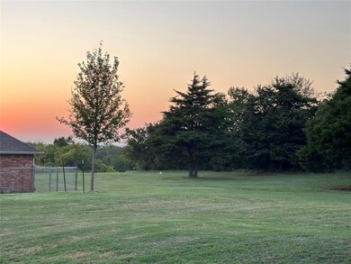 View of yard at dusk