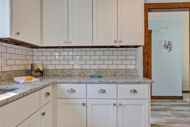 Newly renovated kitchen  with subway backsplash an
