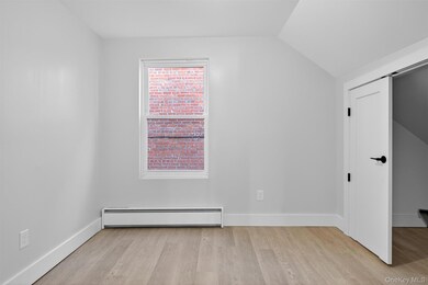 Bedroom with walkthrough closet storage
