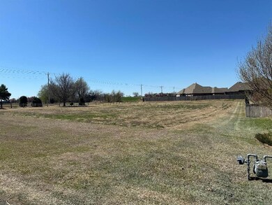 View of yard with a rural view