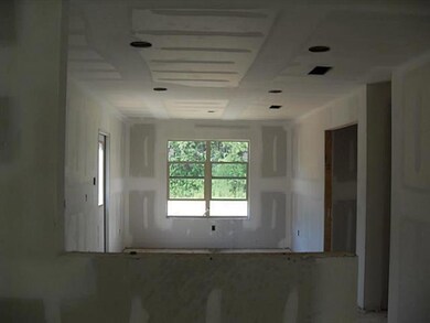 Kitchen. Kitchen, bar, breakfast looking toward re