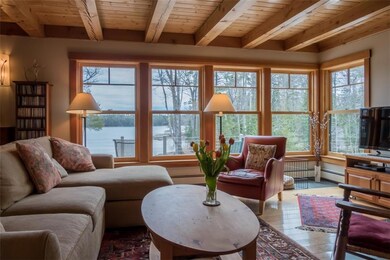 Living room with a wall of windows...