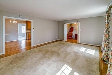 View of living room accessing hallway.   Doors can