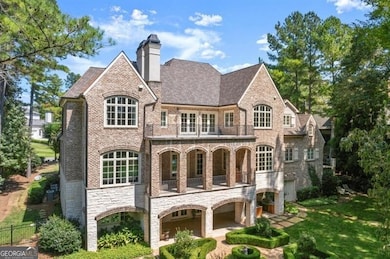 Expansive backyard with a harmonious connection to the amazing water views and the meticulously landscaped English Garden