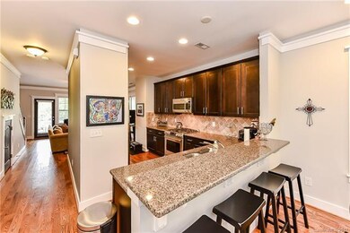 Beautiful kitchen with dark cabinets