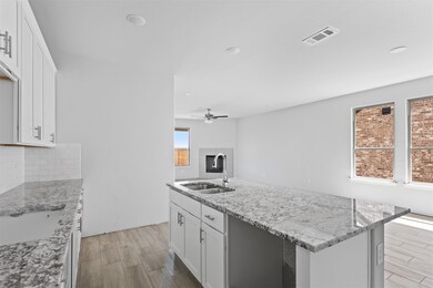 Kitchen with plenty of natural light, sink, ceilin