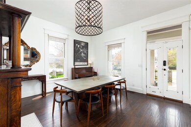 View of the front door and dinning room.