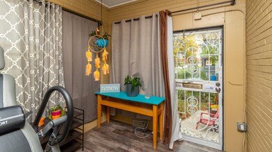 Front Porch is Enclosed with ceiling Fan