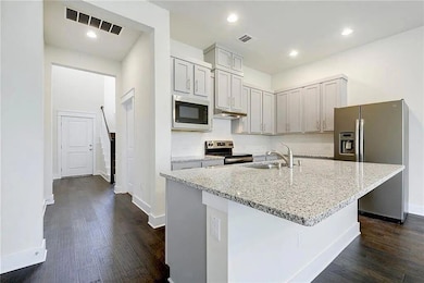 Kitchen featuring stainless steel appliances, a s