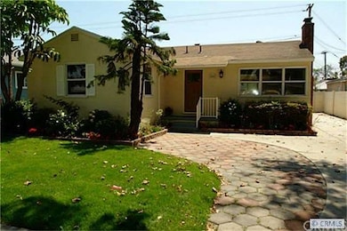 Front parking and side driveway with new windows