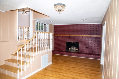 Living room with gas log fireplace