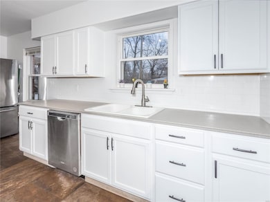New cabinets, corian counters & stainless dishwasher