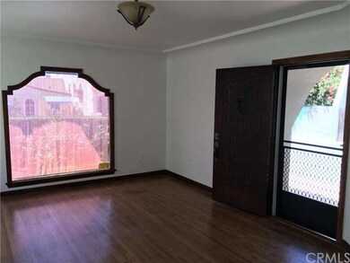 Gorgeous hardwood floors and a big bay window in t
