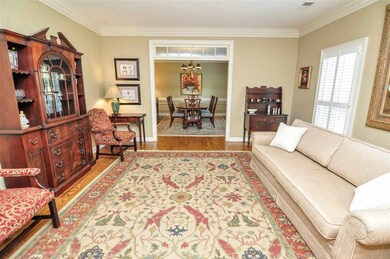 The formal living room is just off the foyer with 