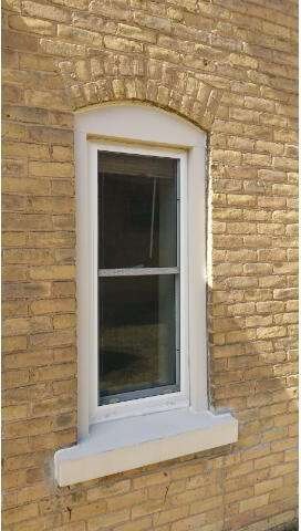 Brick Architectural View, all newer vinyl windows,