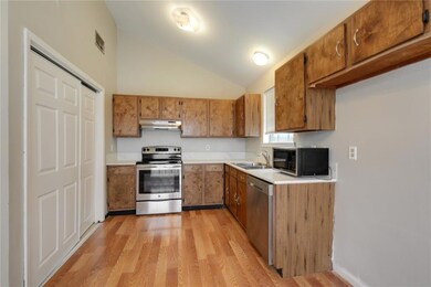 Kitchen with new counters and stainless appliances