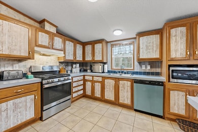 263 Mudgett Rd, Kenduskeag, ME 04450 - photo 5