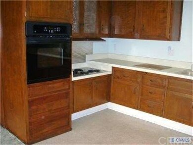 View of Kitchen looking toward cooktop and newer o