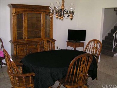 Formal dining is available in this very bright roo