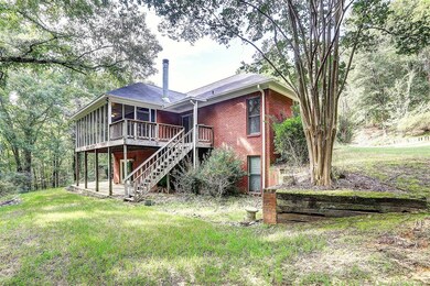 Back of house --upper level screened back deck, lo