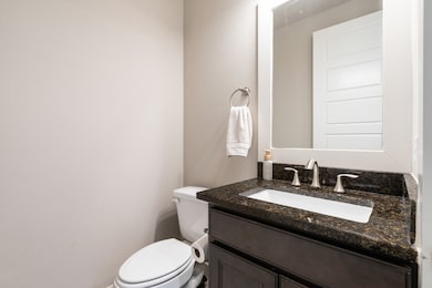 Half Bath is conveniently located for Guests.