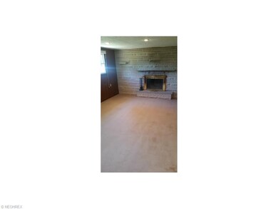 full wall stone fireplace in the family room, has 