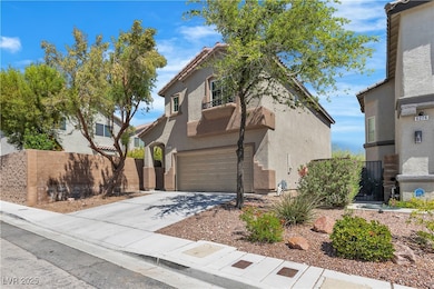 Mediterranean / spanish home with a garage, stucco