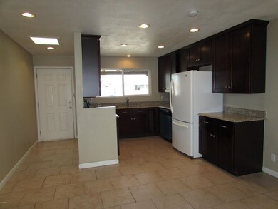 3-Front Entry & Kitchen
